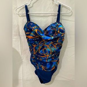 Like New blue one-piece swimsuit with sarong by Chuck Handy, size 12.